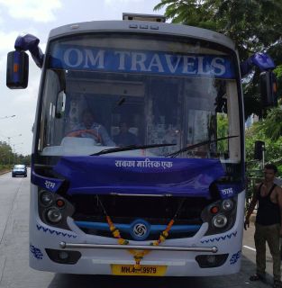 Om Travels Non-AC Seater outside photo