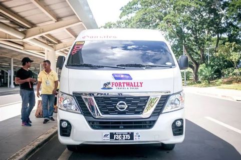 Fortwally Travel and Tours Tourist Van + Ferry outside photo